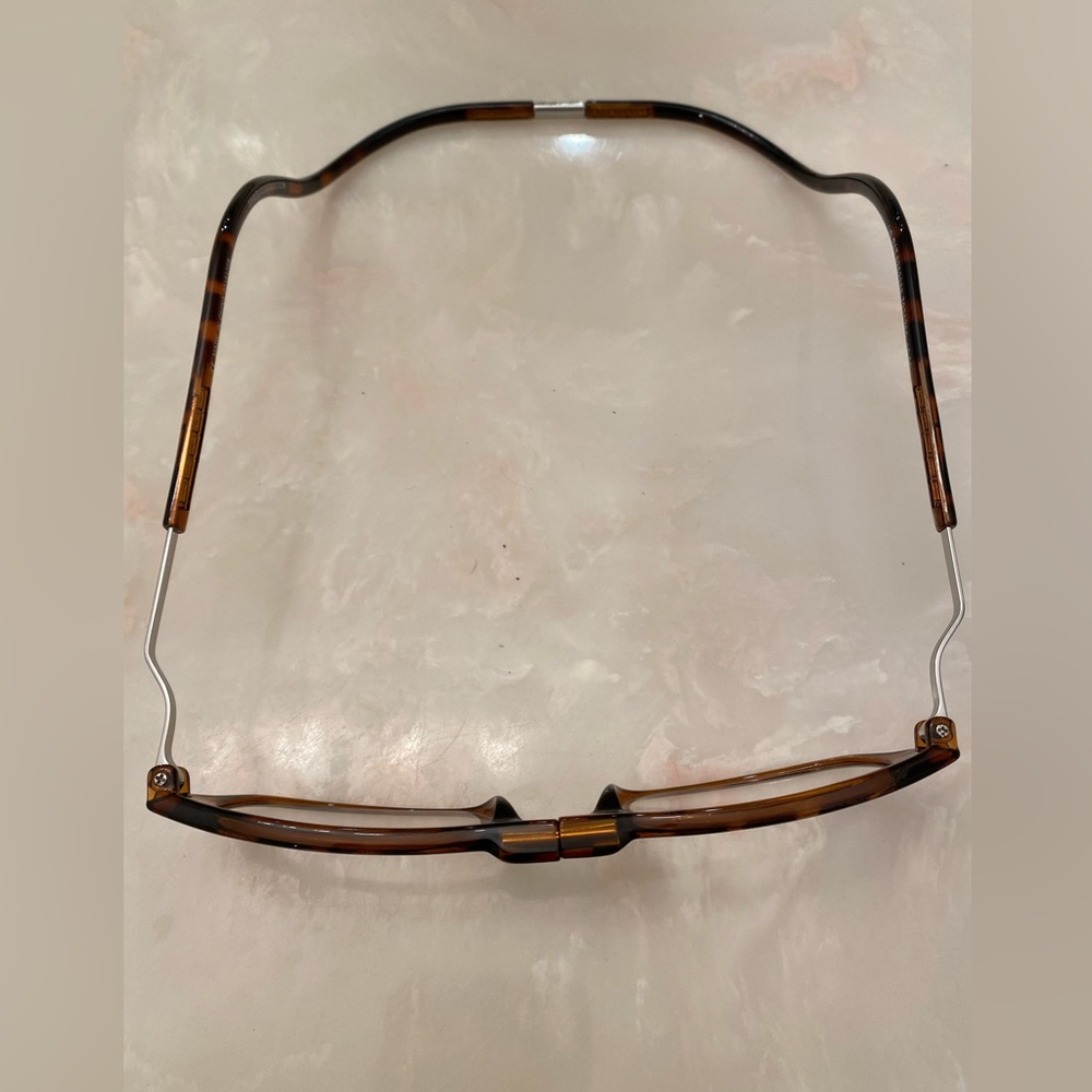 Reading glasses that go around your neck. 150